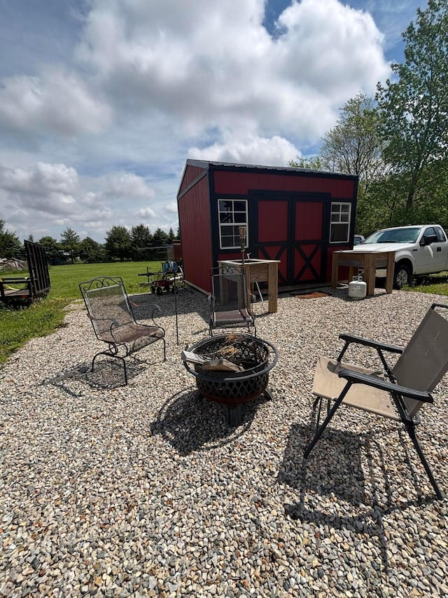 2309 N Houston Pike, South Vienna, OH 45369 - view of shed featuring an outdoor fire pit