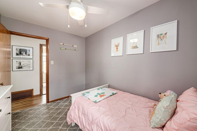 2380 Cranford Rd, Upper Arlington, OH 43221 - bedroom with dark wood finished floors, a ceiling fan, and baseboards