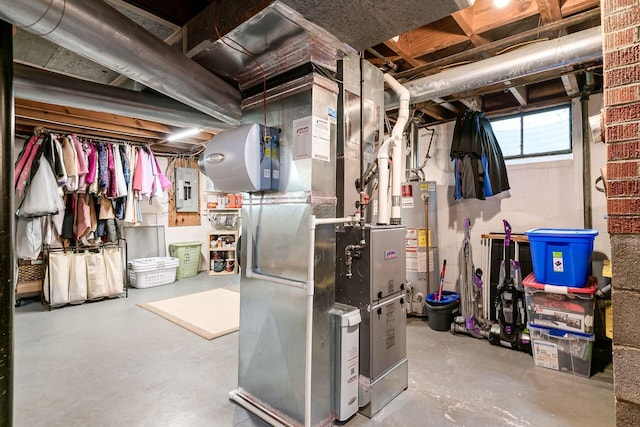 2380 Cranford Rd, Upper Arlington, OH 43221 - basement featuring gas water heater, electric panel, and heating unit