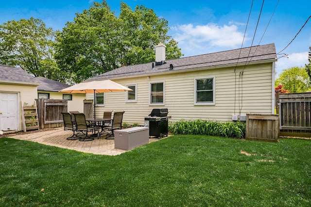 2380 Cranford Rd, Upper Arlington, OH 43221 - back of property with a patio area and a chimney