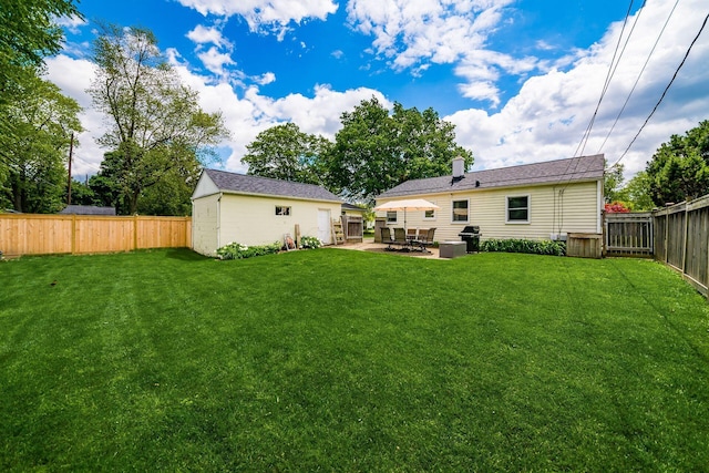 2380 Cranford Rd, Upper Arlington, OH 43221 - back of house with a patio, an outdoor structure, and a chimney