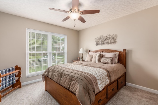4989 Edgeley Dr, Hilliard, OH 43026 - bedroom with baseboards, light colored carpet, and ceiling fan