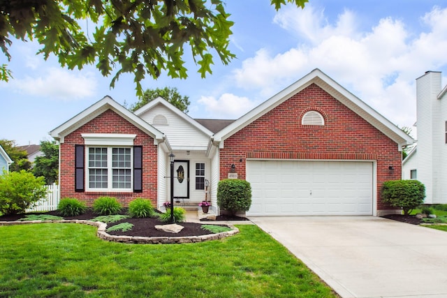 4989 Edgeley Dr, Hilliard, OH 43026 - view of front of property with brick siding, driveway, and an attached garage