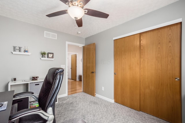 4989 Edgeley Dr, Hilliard, OH 43026 - office space featuring carpet, a ceiling fan, a textured ceiling, and baseboards