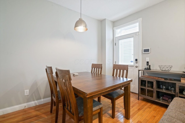 963 Delaware Ave, Columbus, OH 43201 - dining area with light wood finished floors and baseboards