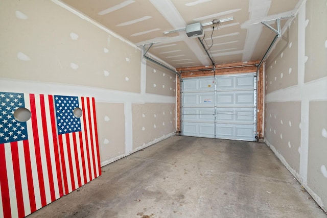 963 Delaware Ave, Columbus, OH 43201 - garage featuring a garage door opener