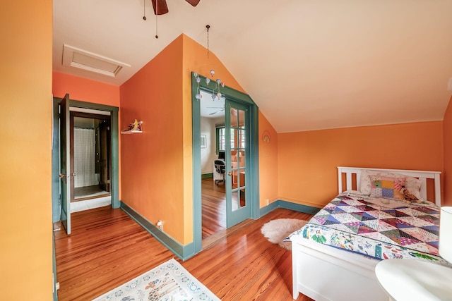 431 Glen Echo Cir, Columbus, OH 43202 - bedroom featuring wood finished floors, vaulted ceiling, baseboards, attic access, and a ceiling fan