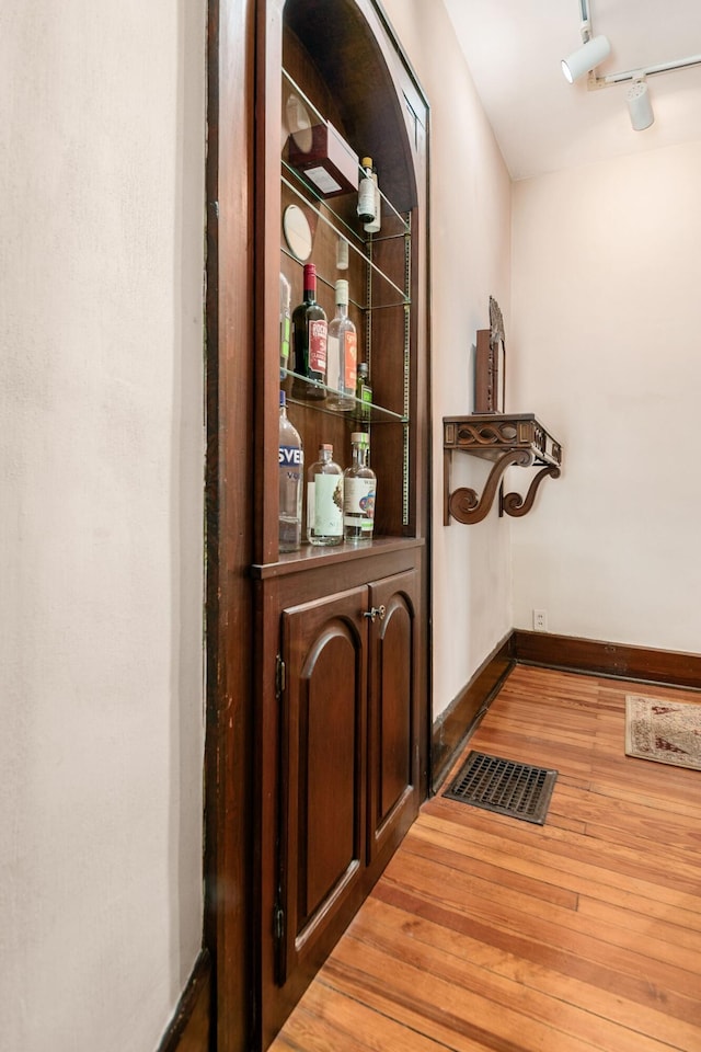 431 Glen Echo Cir, Columbus, OH 43202 - hall featuring hardwood / wood-style flooring, rail lighting, and baseboards