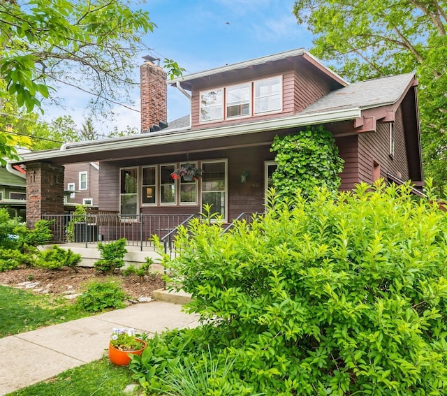 431 Glen Echo Cir, Columbus, OH 43202 - bungalow-style home with a porch and a chimney