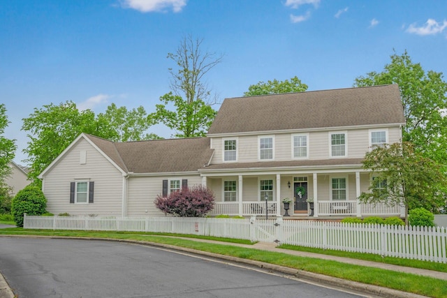 3792 Bentworth Ln Unit 98, Columbus, OH 43230 - colonial-style house with covered porch, a fenced front yard, and a gate