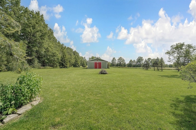 14980 Robins Rd, Johnstown, OH 43031 - view of green lawn featuring a pole building and an outbuilding
