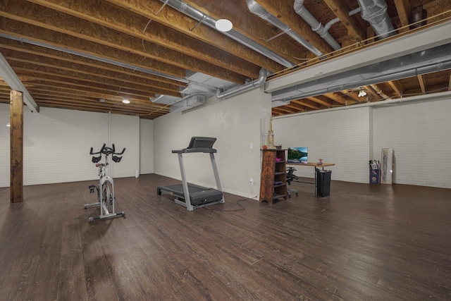 14980 Robins Rd, Johnstown, OH 43031 - exercise room featuring brick wall and wood finished floors