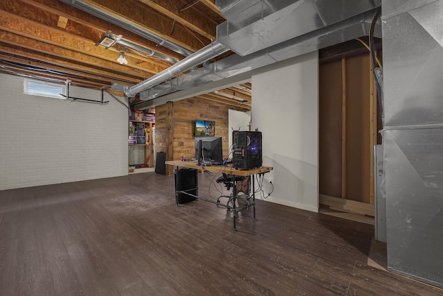 14980 Robins Rd, Johnstown, OH 43031 - below grade area with wood finished floors and brick wall