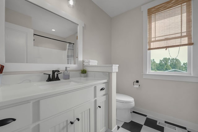 14980 Robins Rd, Johnstown, OH 43031 - full bathroom with tile patterned floors, toilet, vanity, baseboards, and a shower with shower curtain