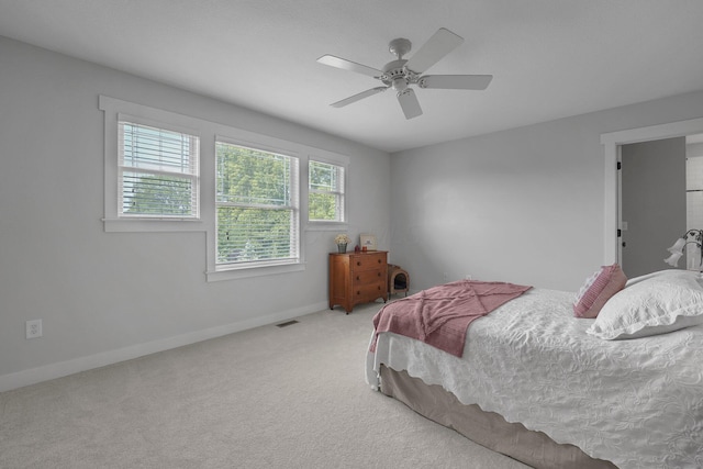 14980 Robins Rd, Johnstown, OH 43031 - bedroom with baseboards, carpet floors, and a ceiling fan