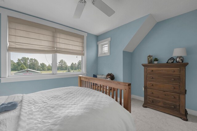 14980 Robins Rd, Johnstown, OH 43031 - bedroom with light colored carpet, ceiling fan, baseboards, and lofted ceiling