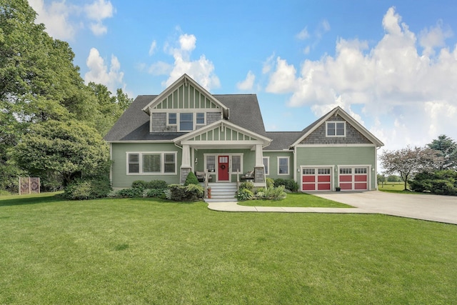 14980 Robins Rd, Johnstown, OH 43031 - craftsman-style house with concrete driveway, a front lawn, and a garage