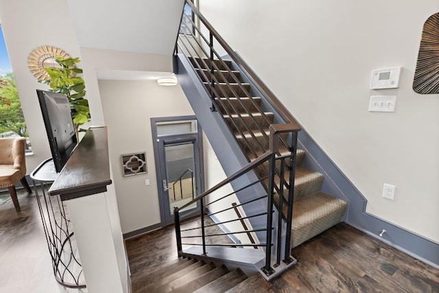 123 Aston Row Ln, Columbus, OH 43201 - stairs with wood finished floors and baseboards