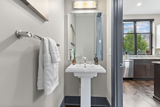 123 Aston Row Ln, Columbus, OH 43201 - bathroom featuring wood finished floors, a sink, and recessed lighting