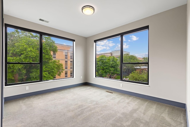 123 Aston Row Ln, Columbus, OH 43201 - carpeted spare room with baseboards