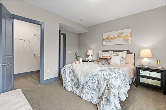 123 Aston Row Ln, Columbus, OH 43201 - bedroom featuring carpet flooring, a spacious closet, baseboards, and a closet