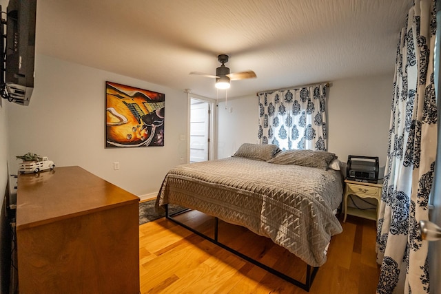 2719 Sulphur Lick Rd, Chillicothe, OH 45601 - bedroom with wood finished floors and a ceiling fan