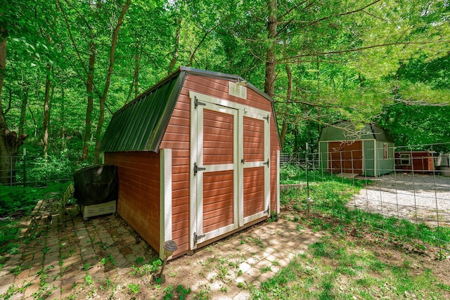 2719 Sulphur Lick Rd, Chillicothe, OH 45601 - view of shed featuring a view of trees