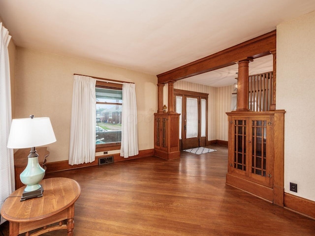 251 Summit St, Marion, OH 43302 - unfurnished room featuring wood finished floors, baseboards, french doors, and decorative columns