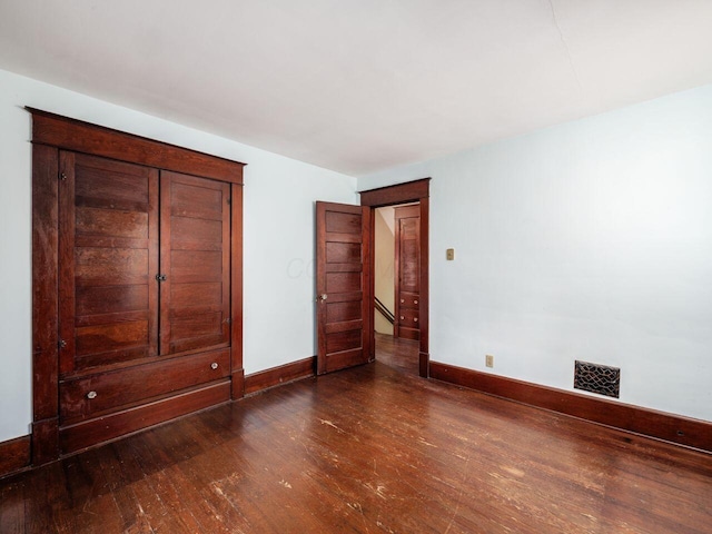 251 Summit St, Marion, OH 43302 - unfurnished bedroom with wood finished floors and baseboards