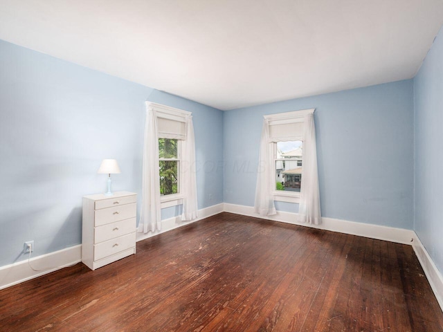 251 Summit St, Marion, OH 43302 - spare room featuring wood-type flooring and baseboards