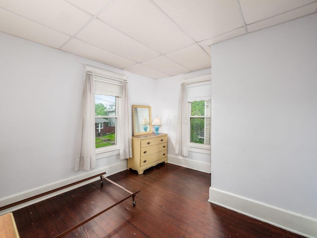 251 Summit St, Marion, OH 43302 - spare room featuring a drop ceiling, wood finished floors, plenty of natural light, and baseboards