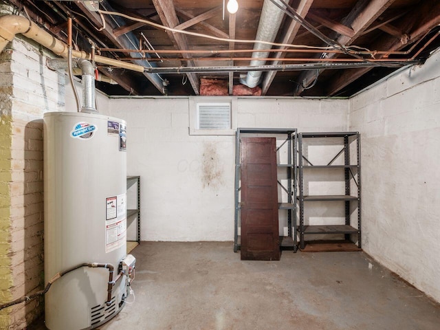 251 Summit St, Marion, OH 43302 - unfinished basement featuring water heater