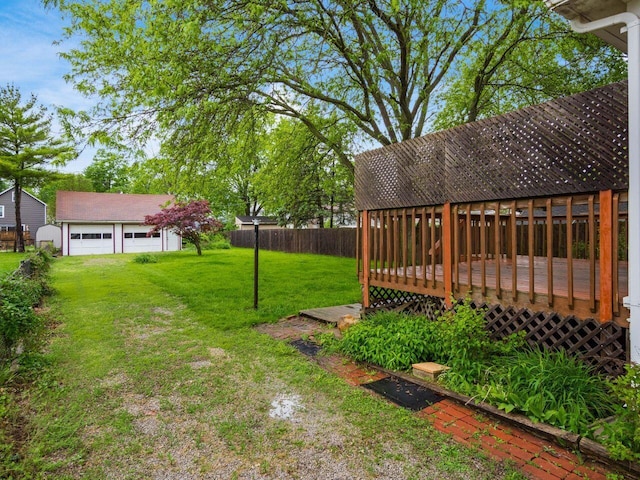 251 Summit St, Marion, OH 43302 - view of yard featuring a wooden deck and a garage