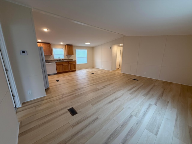 45 Winter Pine Dr, Delaware, OH 43015 - unfurnished living room featuring a sink, light wood-type flooring, and recessed lighting