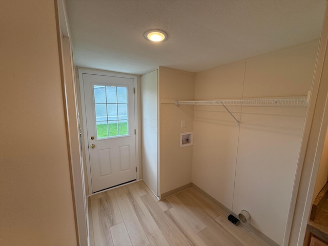 45 Winter Pine Dr, Delaware, OH 43015 - laundry room featuring light wood finished floors and washer hookup