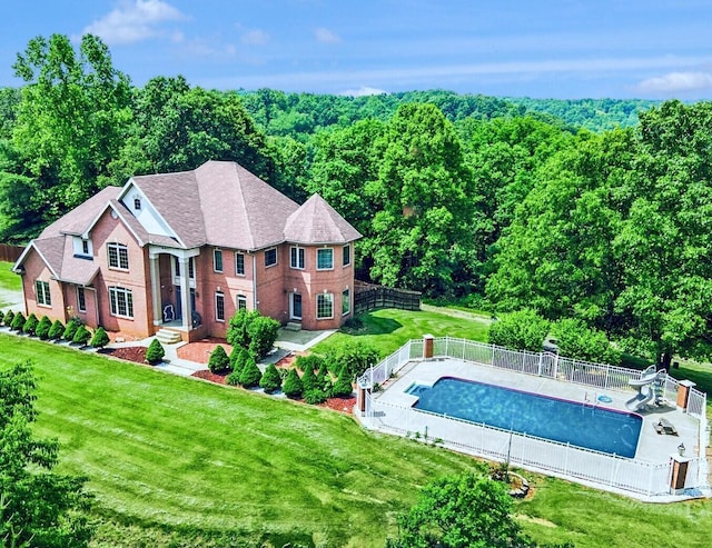 40455 Cone Rd, Albany, OH 45710 - view of pool featuring a water slide, a fenced backyard, and a wooded view