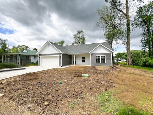13541 Queen Rd NE, Thornville, OH 43076 - ranch-style home featuring a garage, concrete driveway, and roof with shingles
