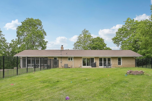 385 Taylor Blair Rd, West Jefferson, OH 43162 - back of property featuring a chimney, central AC, and brick siding