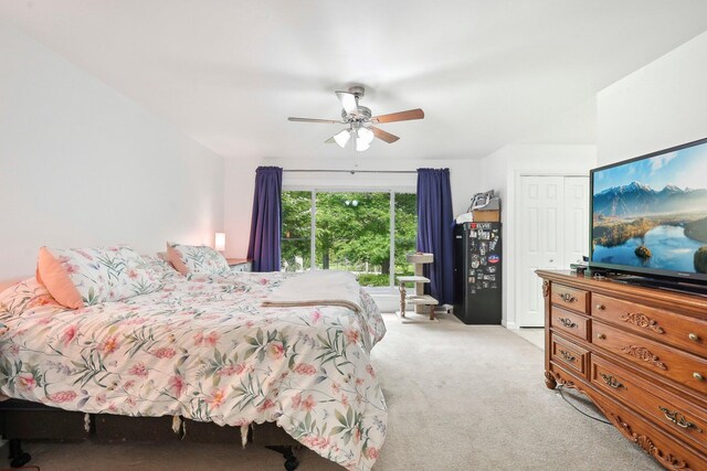 385 Taylor Blair Rd, West Jefferson, OH 43162 - bedroom with light colored carpet, a closet, and ceiling fan