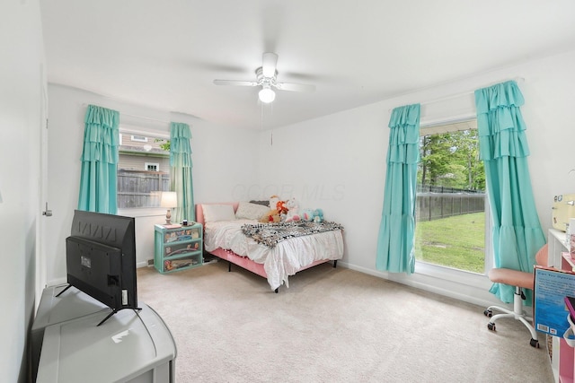 385 Taylor Blair Rd, West Jefferson, OH 43162 - bedroom featuring multiple windows, carpet floors, and ceiling fan