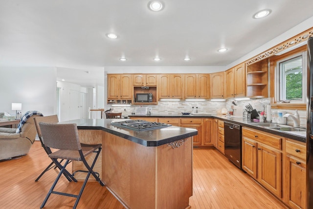 385 Taylor Blair Rd, West Jefferson, OH 43162 - kitchen with black appliances, open shelves, a breakfast bar, dark countertops, and recessed lighting