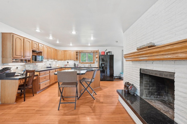 385 Taylor Blair Rd, West Jefferson, OH 43162 - kitchen featuring black appliances, open shelves, dark countertops, a kitchen breakfast bar, and decorative backsplash