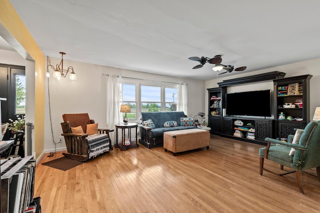 4736 Roberts Rd, Caledonia, OH 43314 - living room with wood-type flooring, a chandelier, and ceiling fan