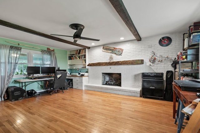 4736 Roberts Rd, Caledonia, OH 43314 - office area with a ceiling fan, wood-type flooring, a brick fireplace, and beamed ceiling