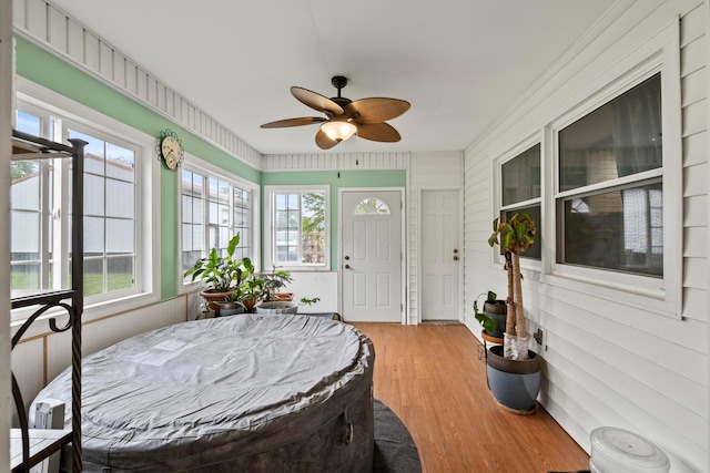 4736 Roberts Rd, Caledonia, OH 43314 - sunroom / solarium featuring wood finished floors and wood walls