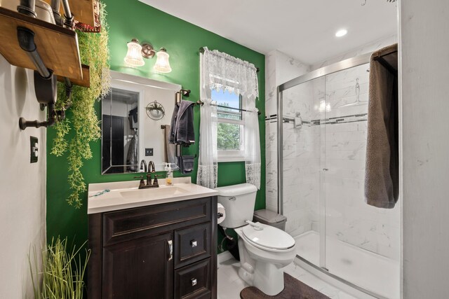 4736 Roberts Rd, Caledonia, OH 43314 - full bathroom featuring toilet, vanity, a shower stall, and recessed lighting