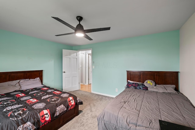 4736 Roberts Rd, Caledonia, OH 43314 - bedroom with carpet flooring, a ceiling fan, and baseboards