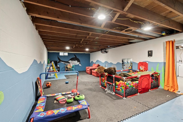 4736 Roberts Rd, Caledonia, OH 43314 - playroom with concrete block wall and concrete flooring