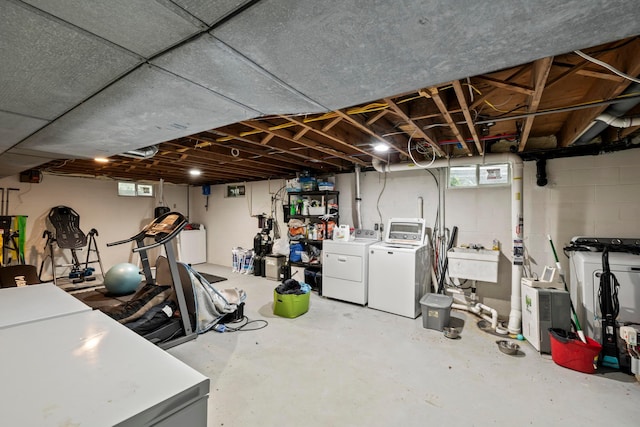 4736 Roberts Rd, Caledonia, OH 43314 - basement with washing machine and dryer and a sink