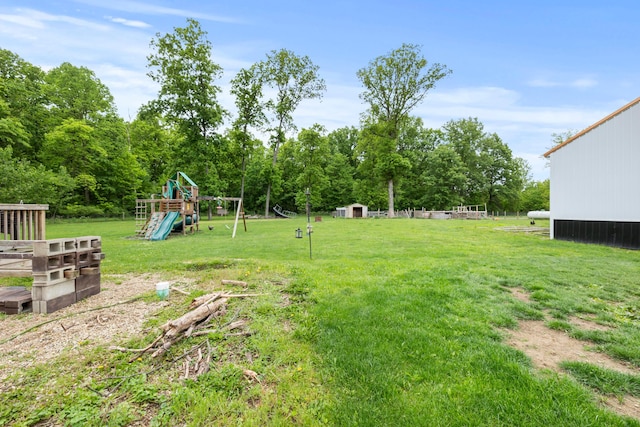 4736 Roberts Rd, Caledonia, OH 43314 - view of green lawn with a playground